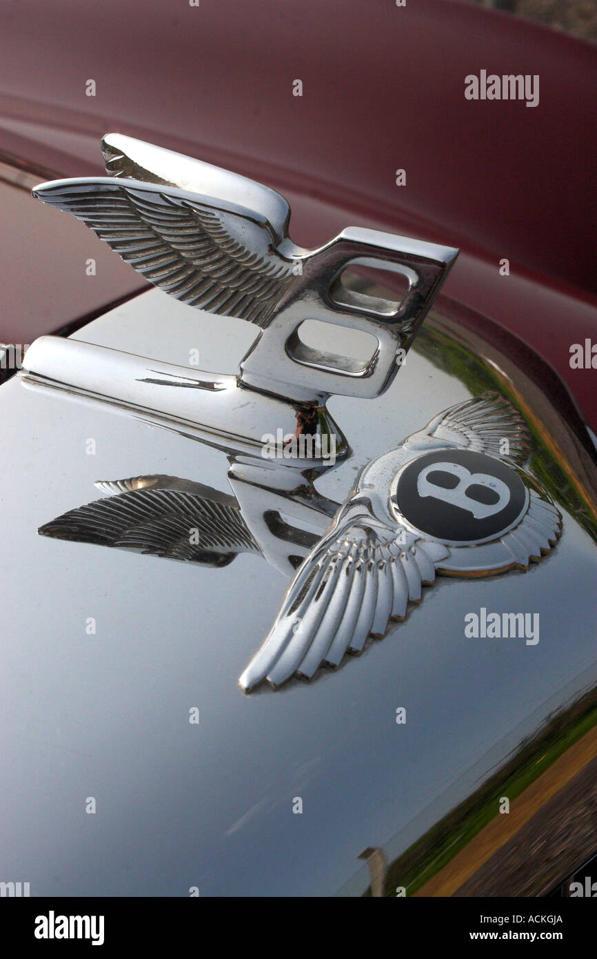 Burgundy coloured Vintage 2 Litre Bentley Motor Car with distinctive badge symbol Stock Photo