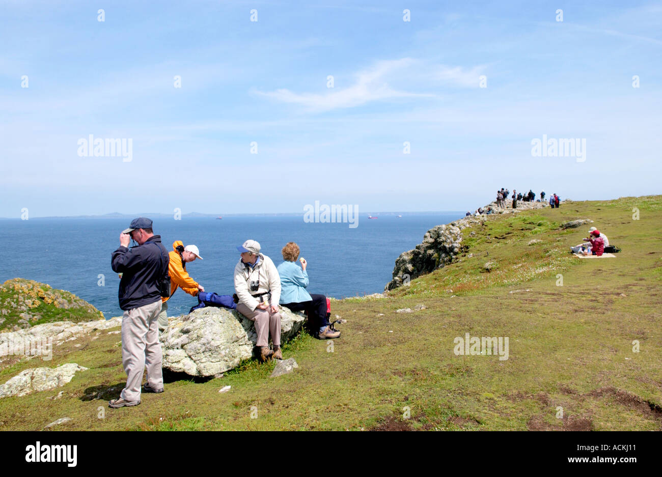 Tourists and birdwatchers on Skomer Island Pembrokeshire Wales UK Stock Photo