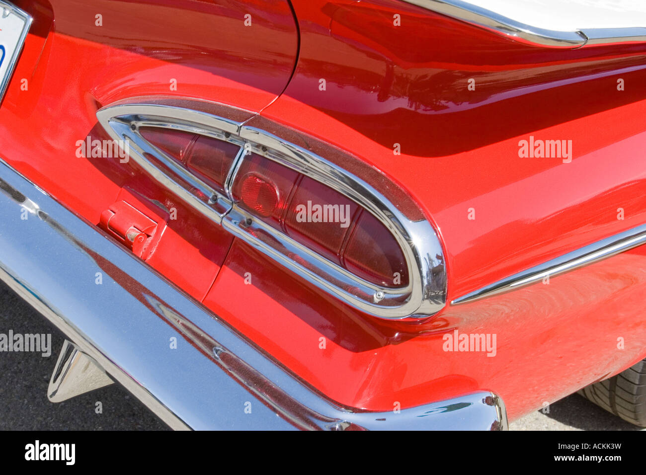 Fins and tail light at the back of a red and white Chevrolet El Camino  classic car at an auto show Stock Photo - Alamy