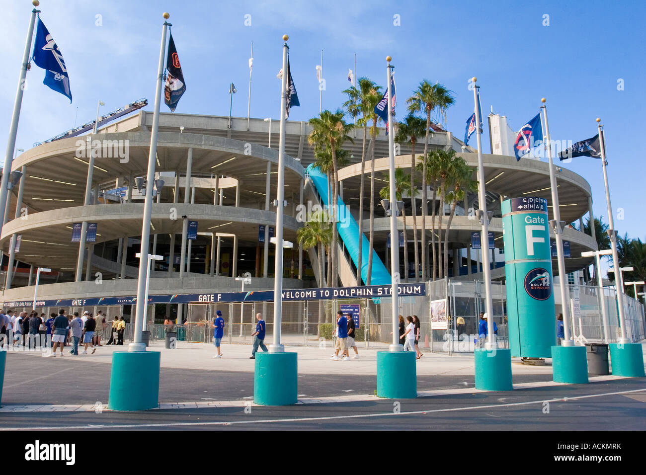 Exterior of Dolphin Stadium with flags from many baseball teams Stock Photo