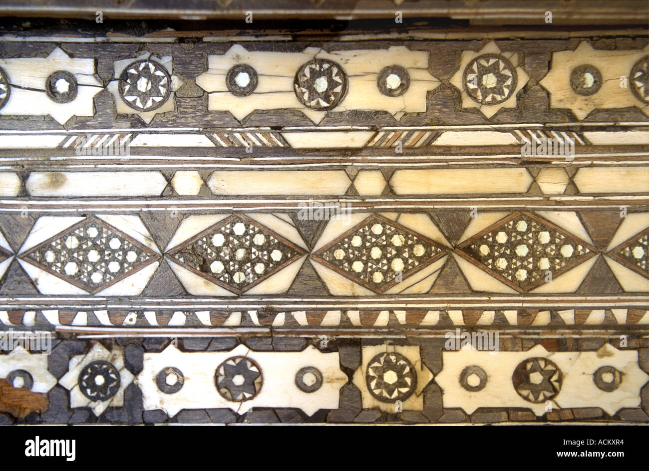 Beautiful detail of inlaid wood and ivory inside the Amber Fort or Palace near Jaipur Rajasthan India Stock Photo
