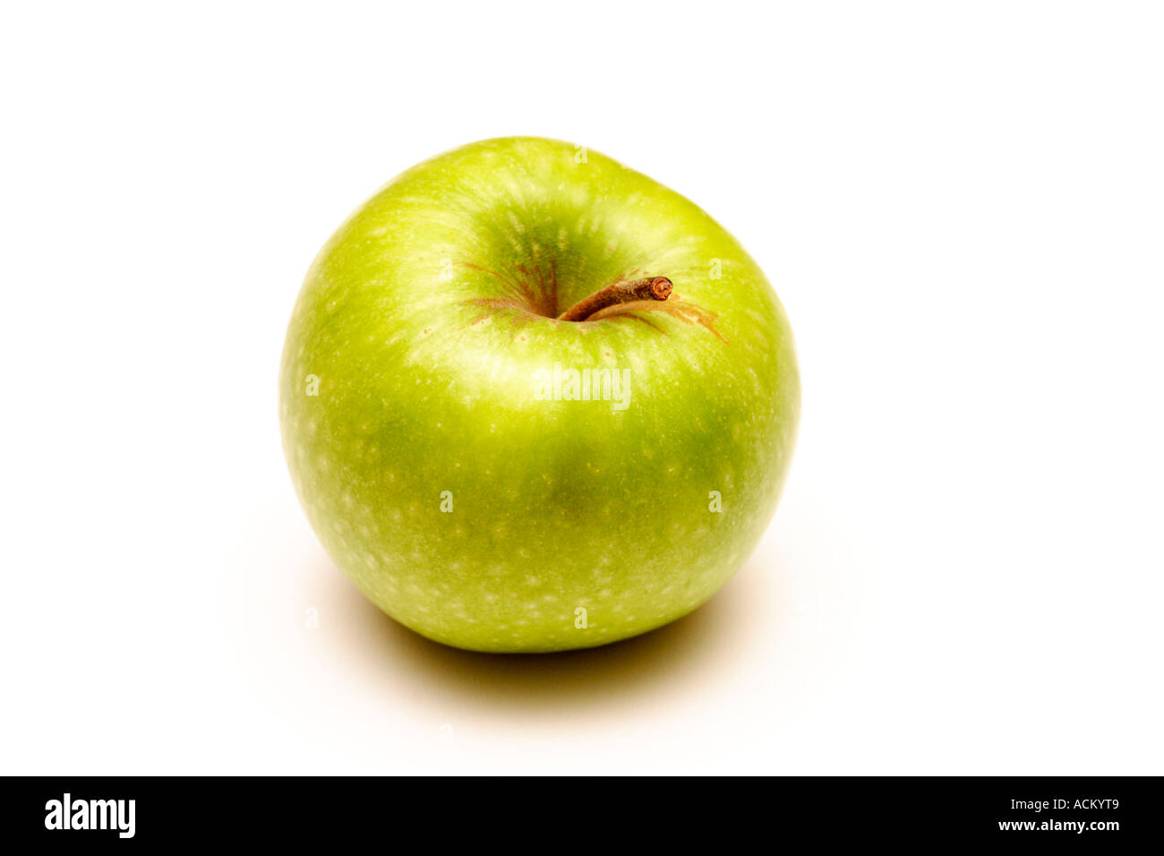 Green apple on a white background Stock Photo - Alamy
