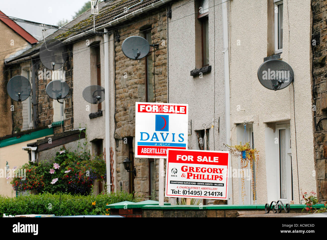 Terraced houses with for sale sign in Abertillery Blaenau Gwent South