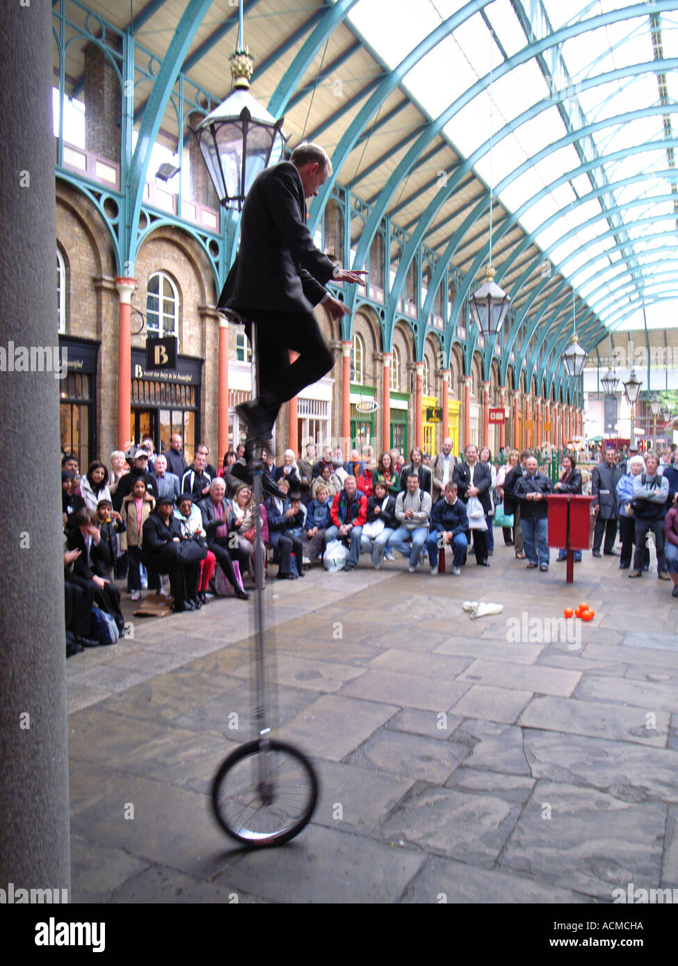 Juggler street performer in the London Covent Garden Apple Market Stock Photo