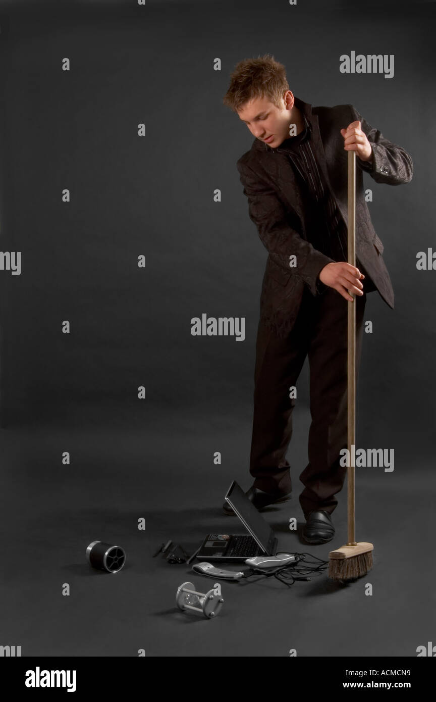 Man with a broom Stock Photo Alamy