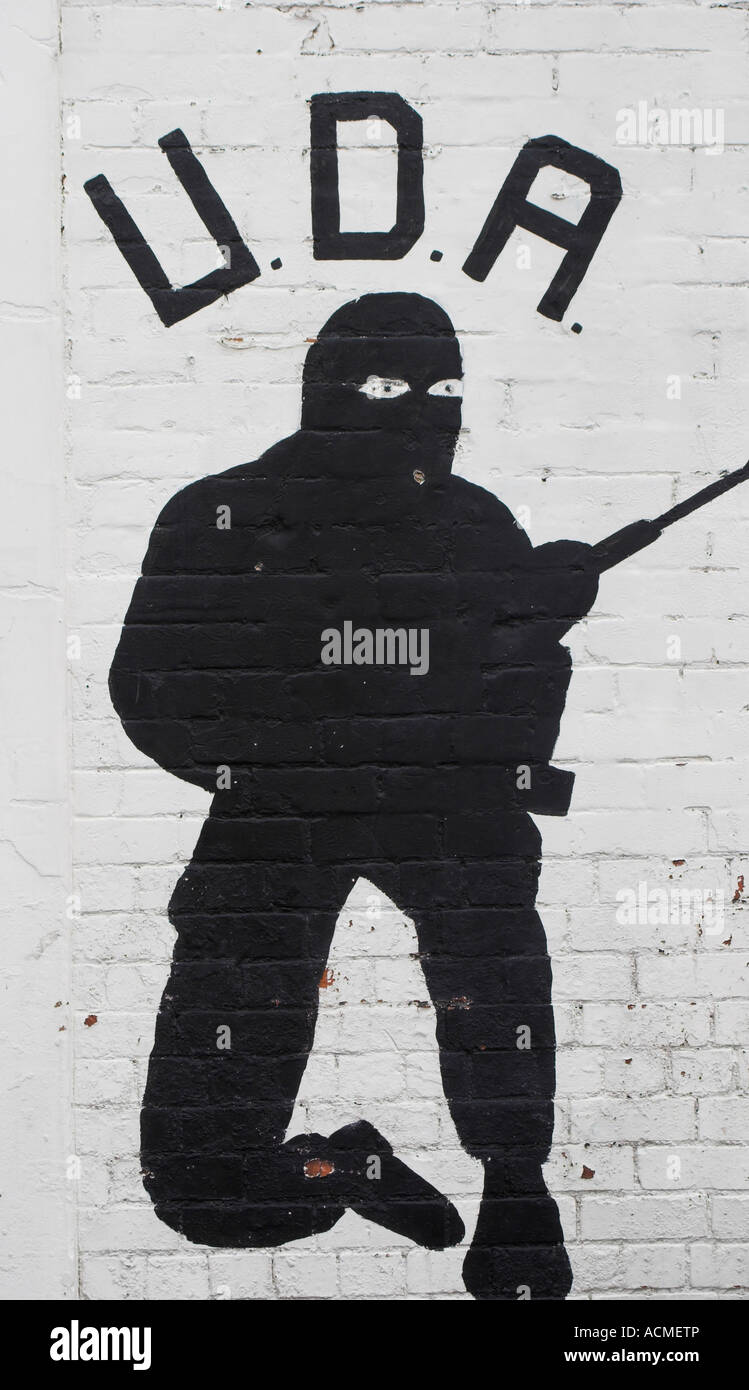 Mural of a silhouette of UDA commando Mural on Downing Street off Shankill Road Belfast County Antrim Northern Ireland Stock Photo