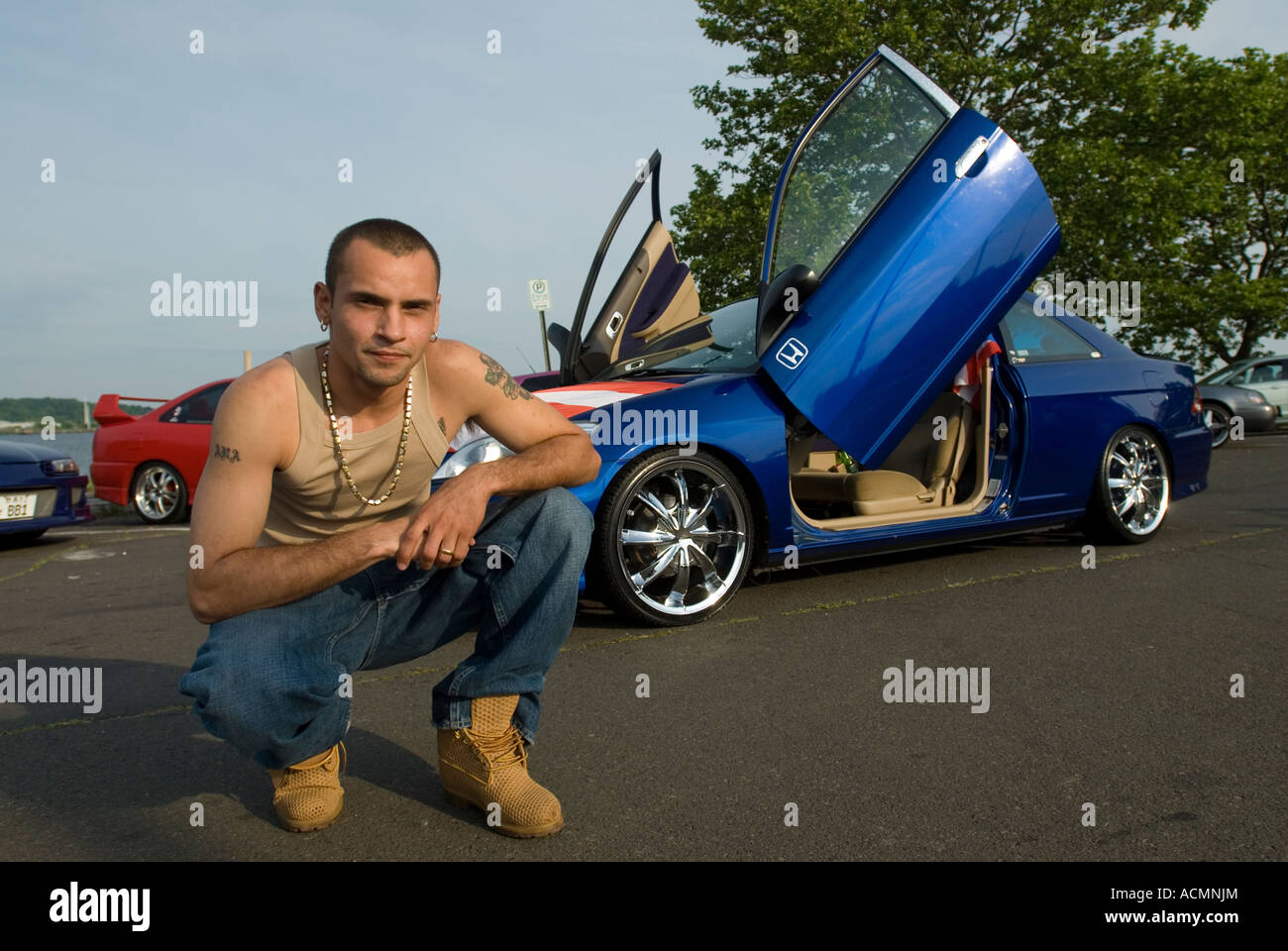 Members of a Car club modify their cars for show. New Haven Connecticut USA Stock Photo