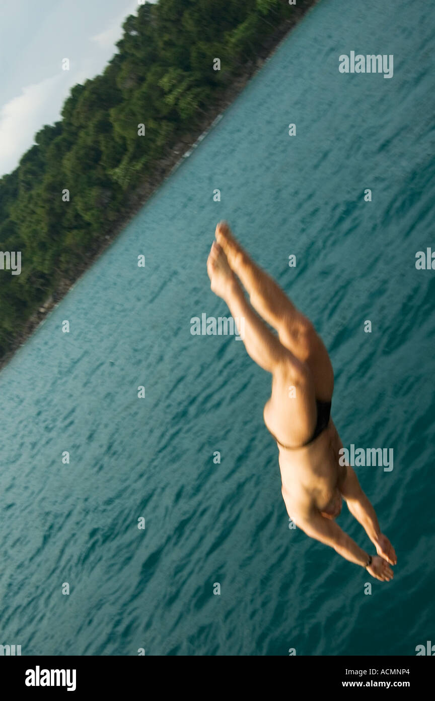 Man diving into the water Stock Photo