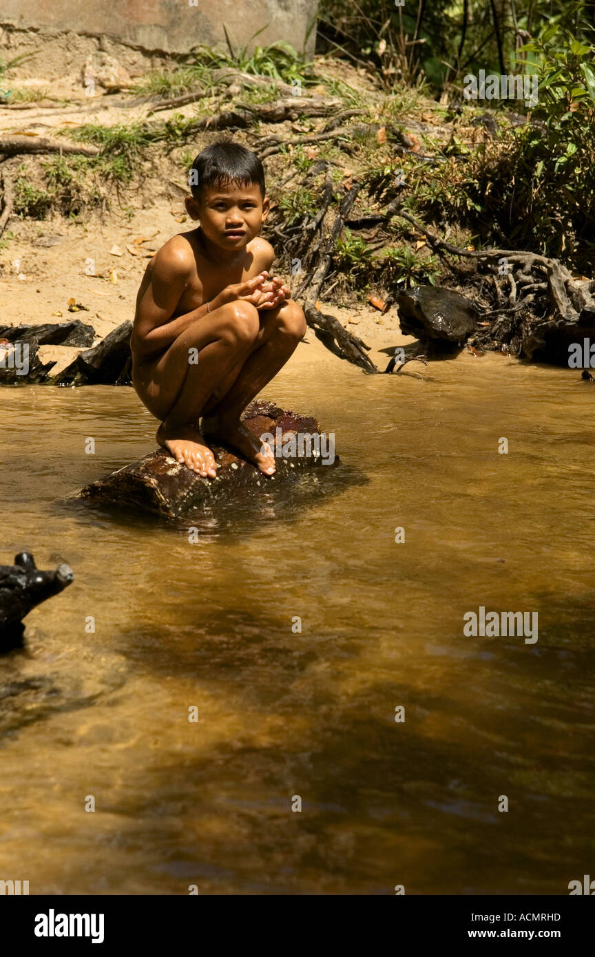 cambodia boys nude Naked Cambodian boy squatting on the stone Stock Photo - Alamy