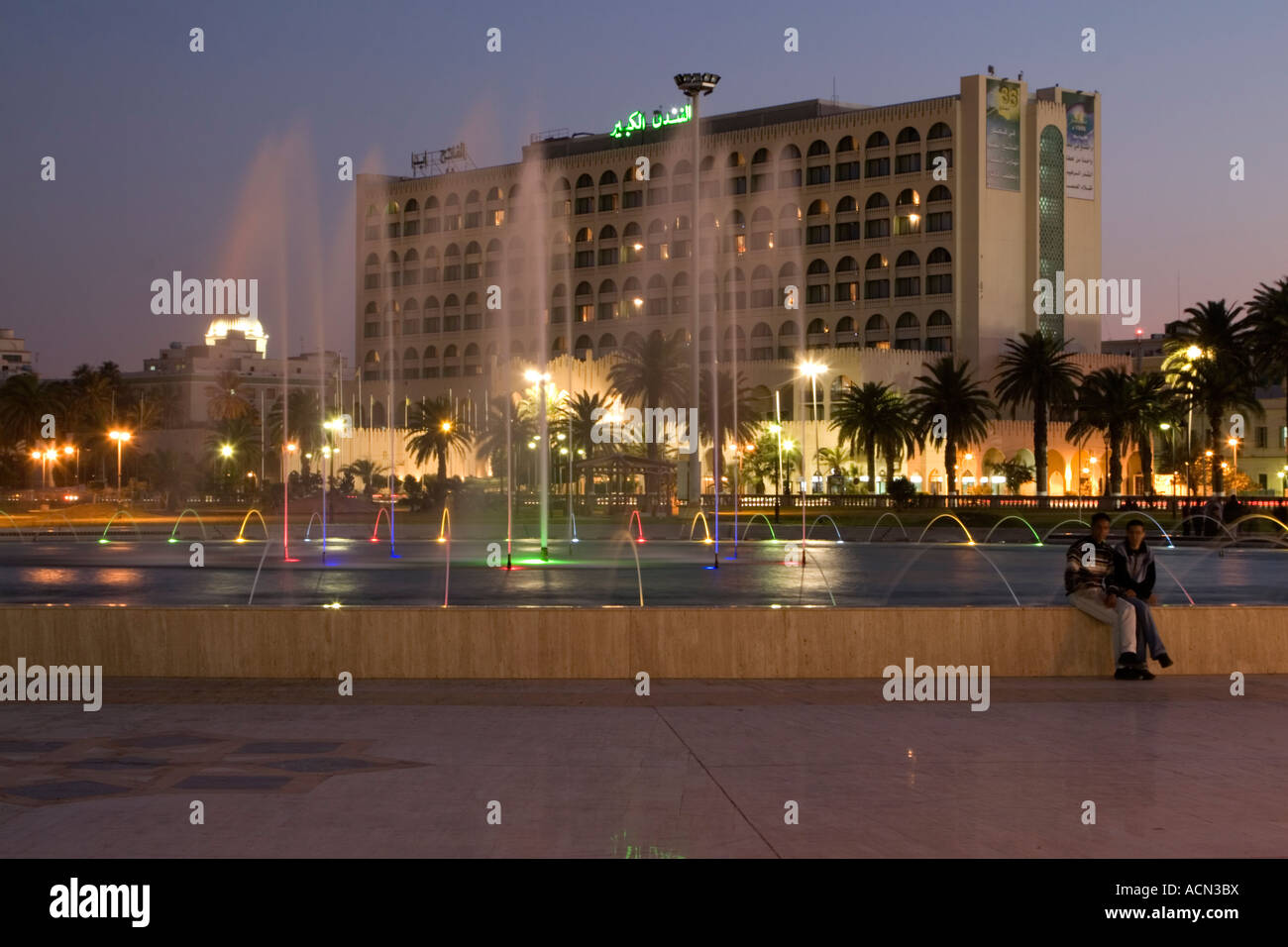 Tripoli, Libya. Grand Hotel (Funduk al Kabir) and Fountain at Dusk