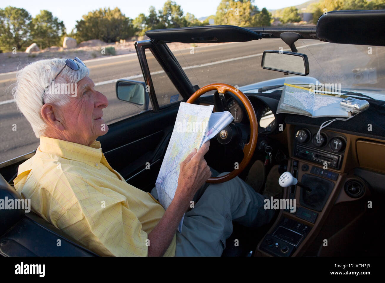 Senior man driving sports car hi-res stock photography and images - Alamy