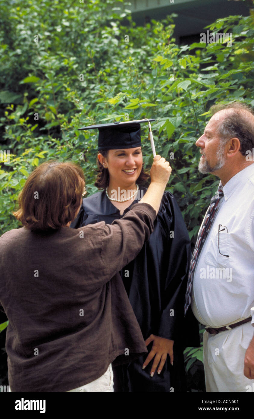 Female Grad with Parents Stock Photo