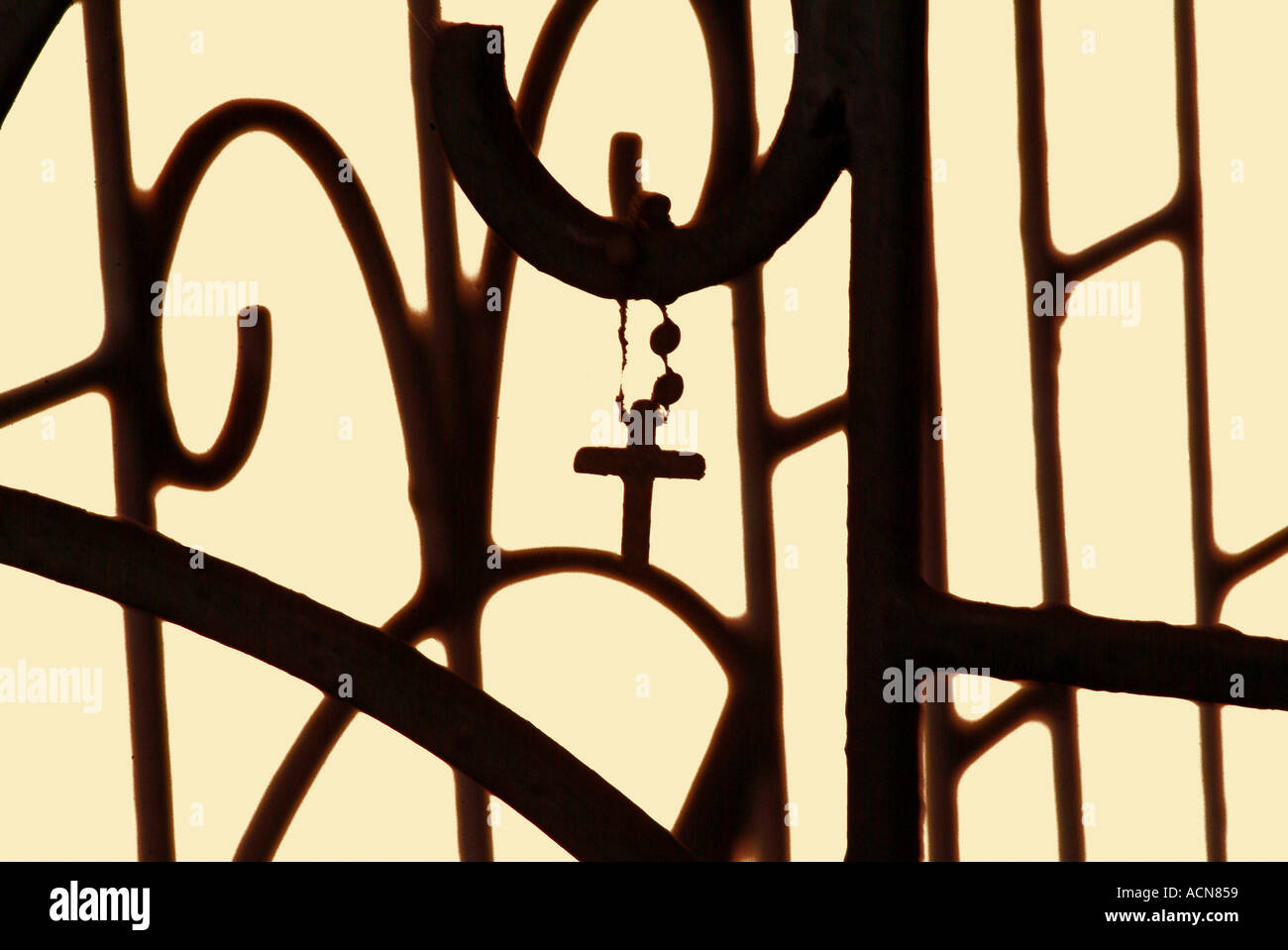 Crucifix On Railings Stock Photo - Alamy