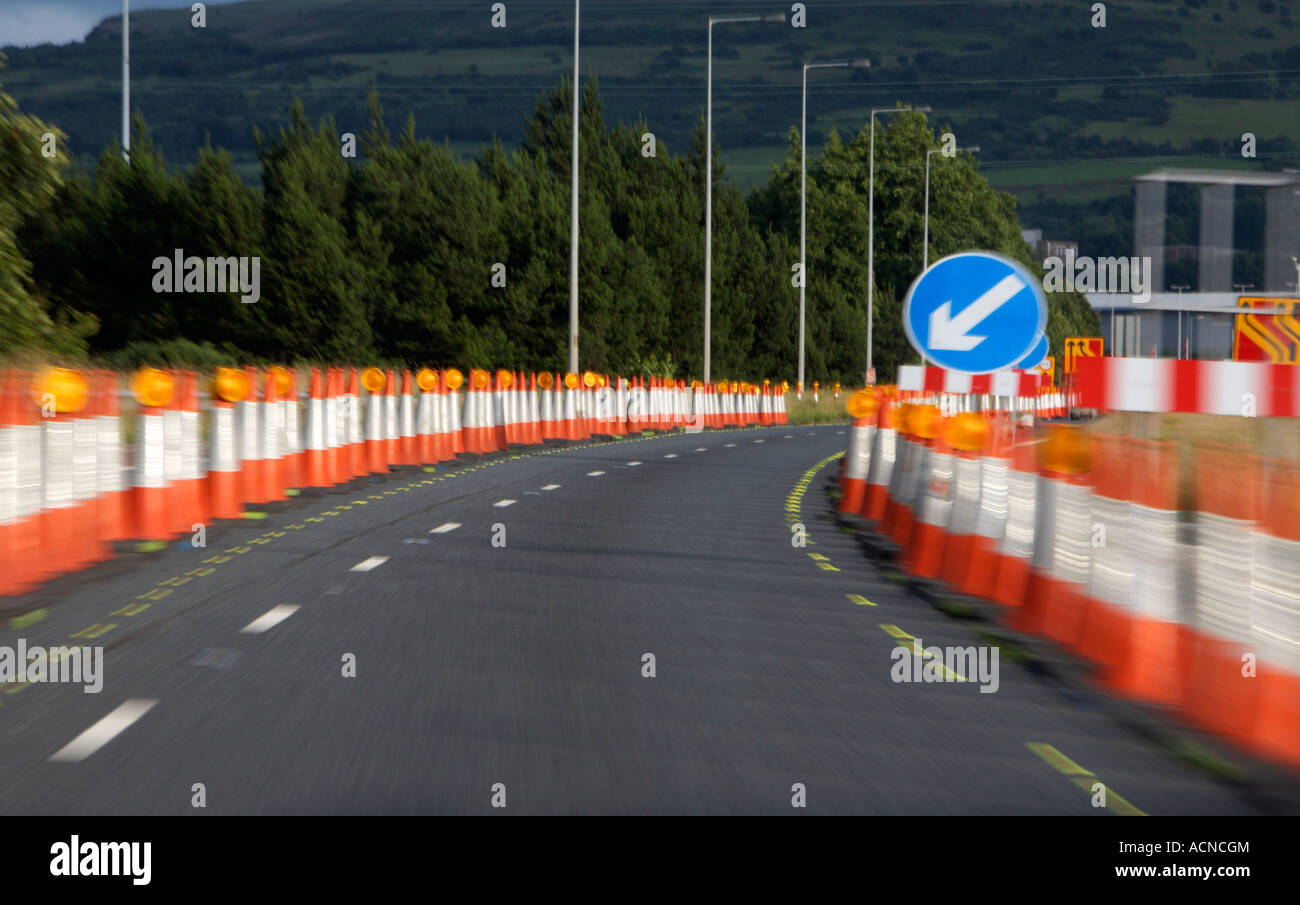 speeding through contraflow lined with traffic cones on the M2 motorway