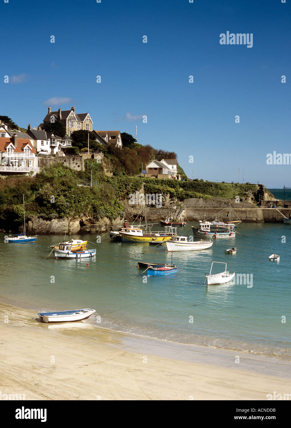 Fishing boats moored in the harbour at Newquay on the north coast of Cornwall in the UK Stock Photo
