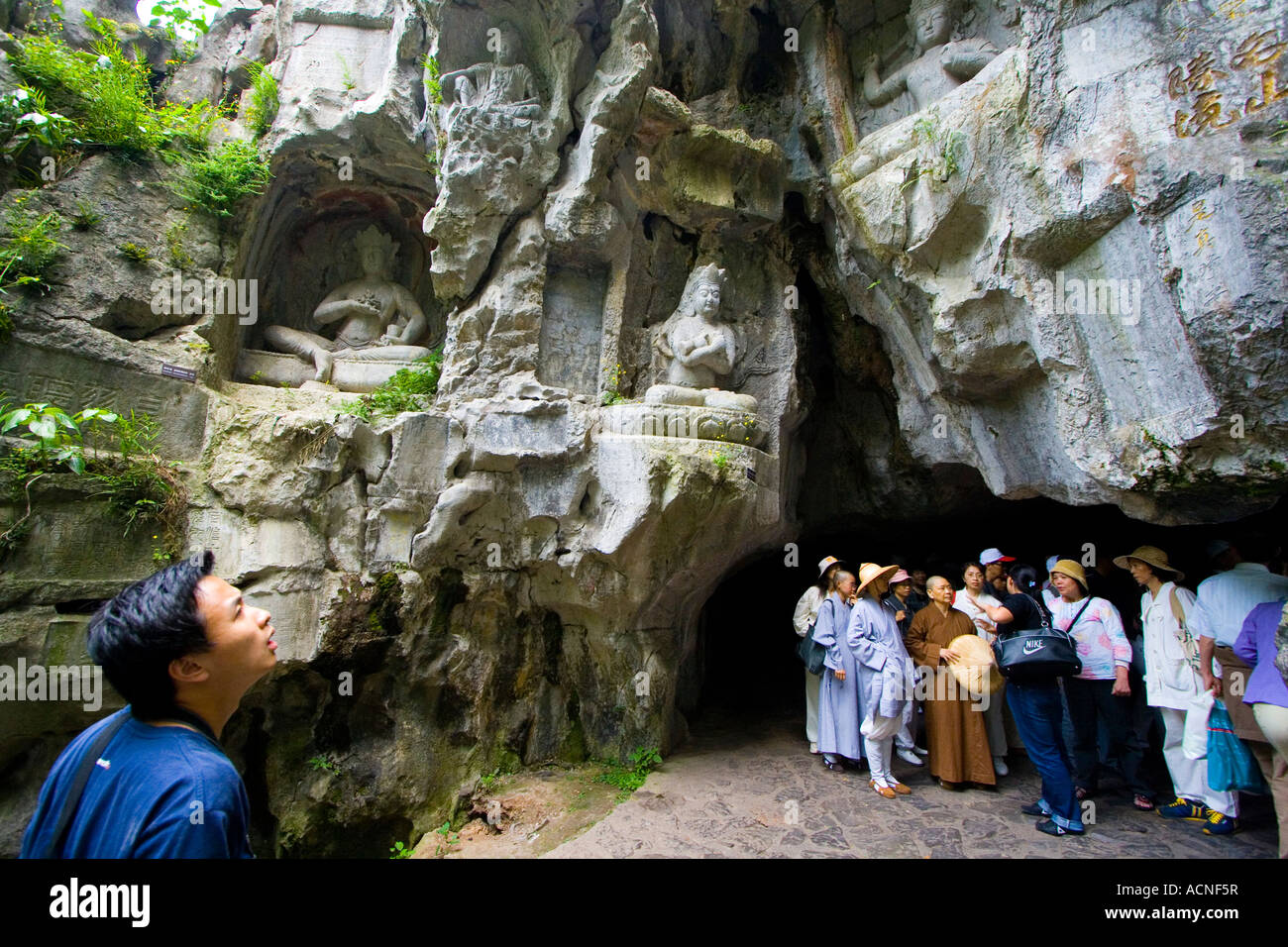 Domestic Chinese Tourists Enjoy Buddhist Rock Carvings Feilai Peak ...