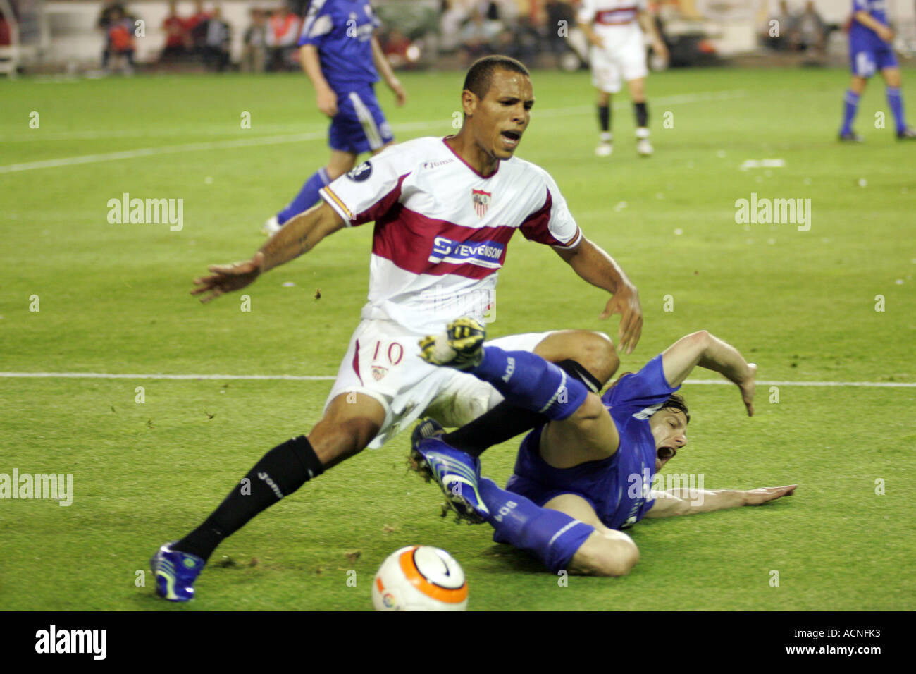 Luis Fabiano and Rafinha fighting for ball Stock Photo