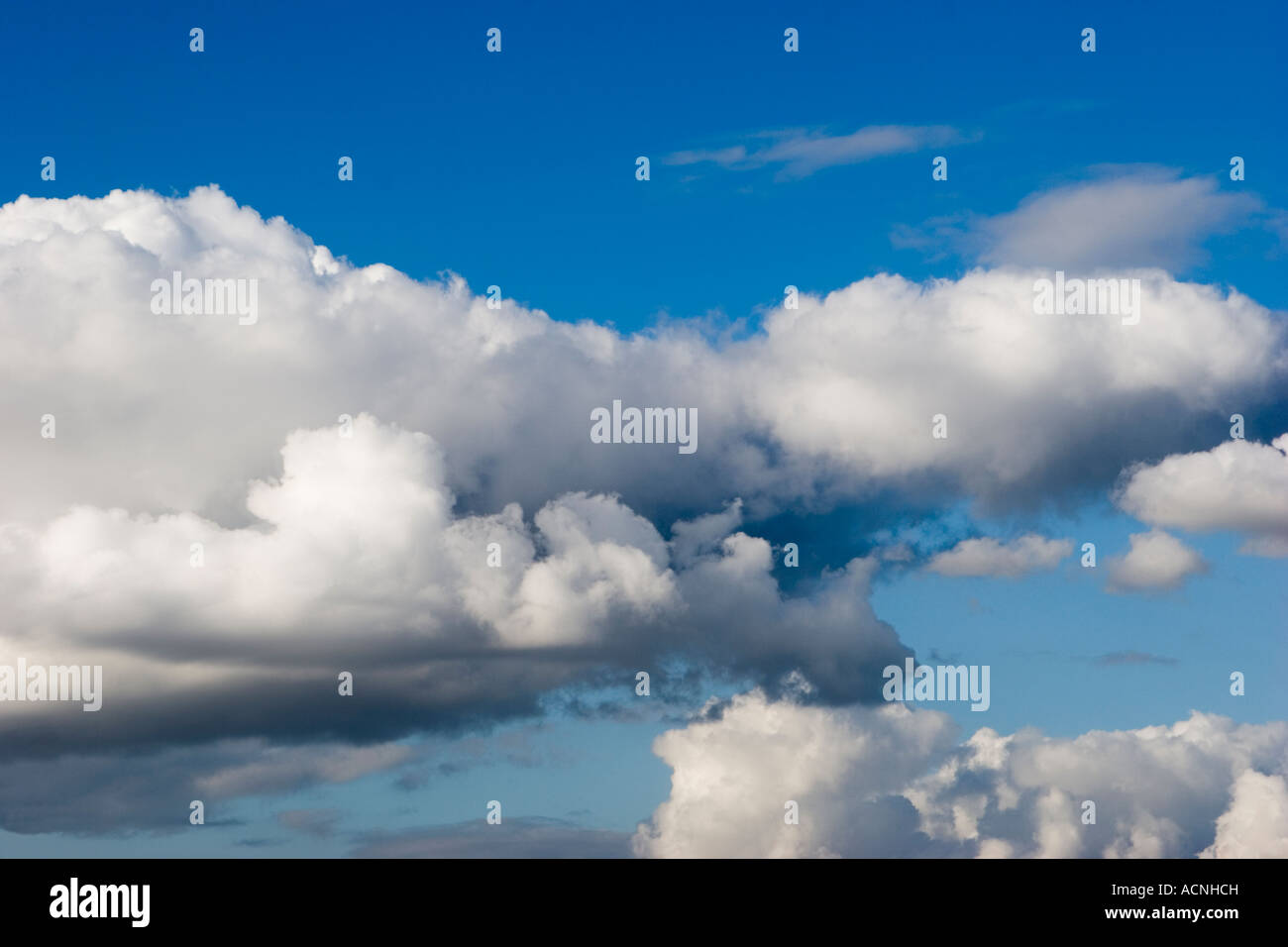 large white clouds against blue sky Stock Photo - Alamy