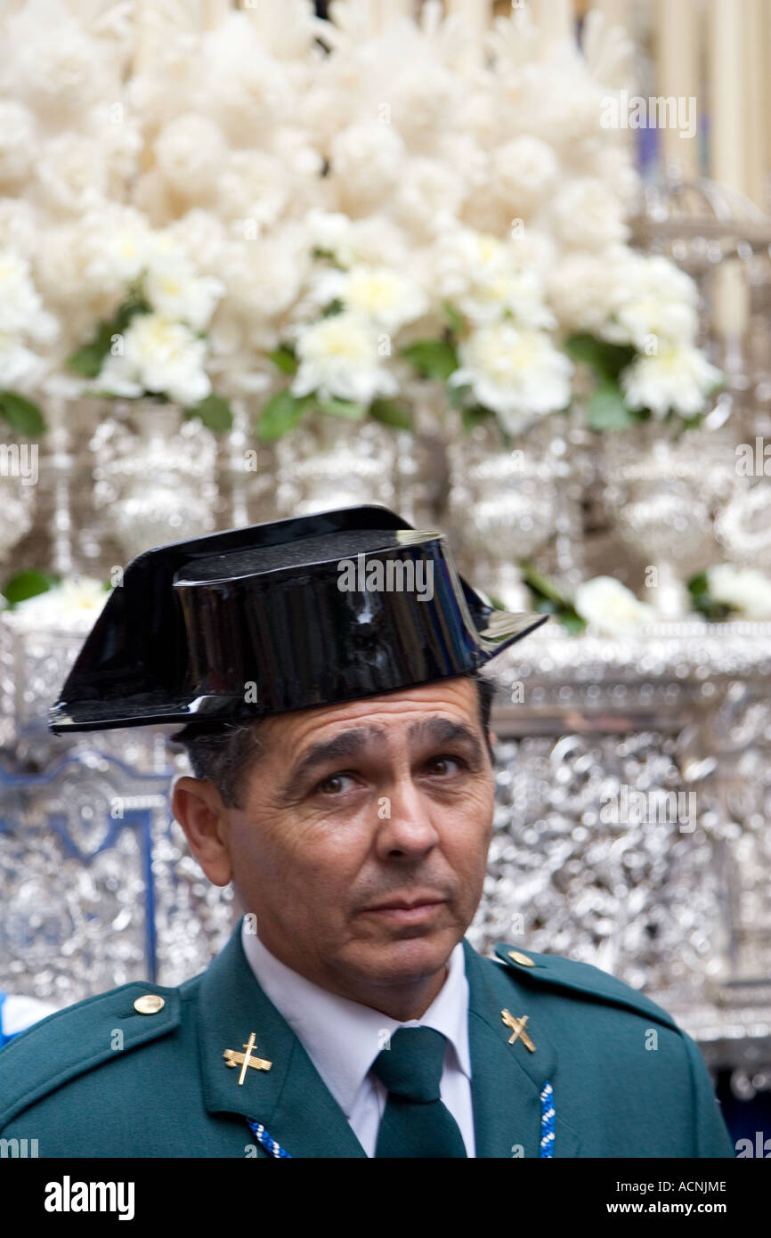 Civil Guard escorting the image of Virgin Mary, Holy Week 2006 Seville Spain Stock Photo