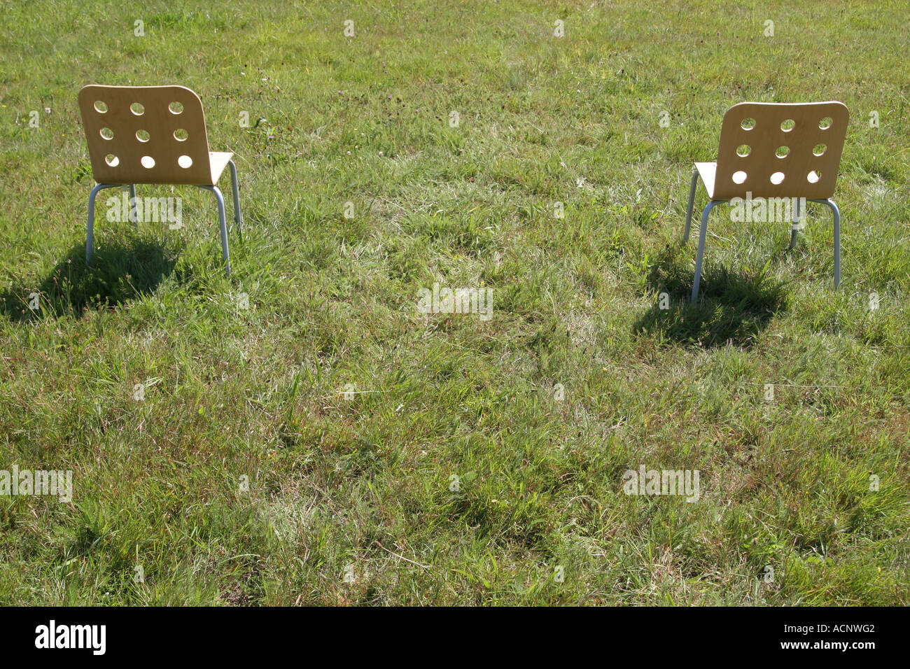 Chairs on the meadow - Stühle im Grünen Stock Photo