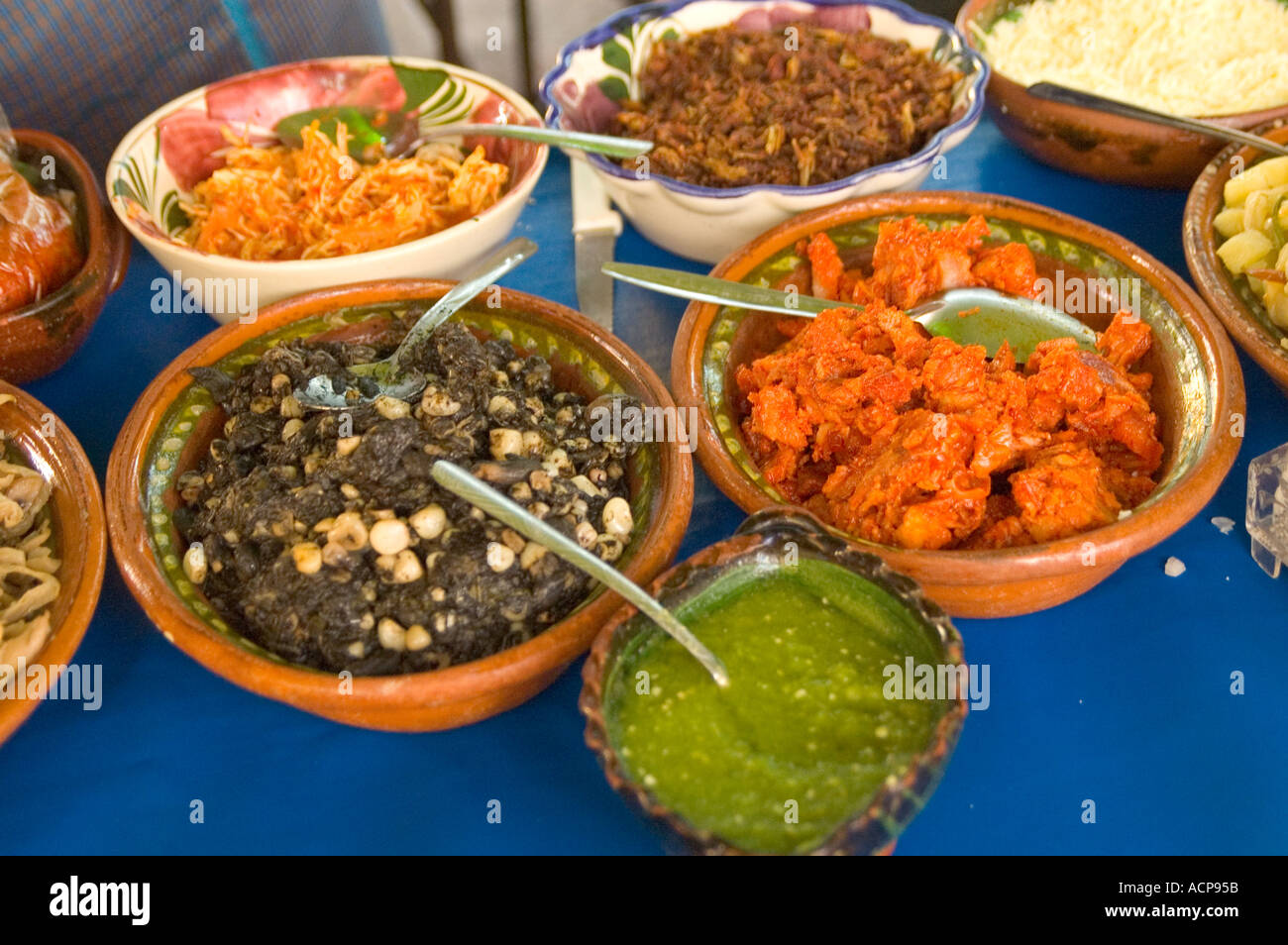 Mexican salsa. Dishes containing different dessings, salsas, spices, gravy, Mexico style. Stock Photo