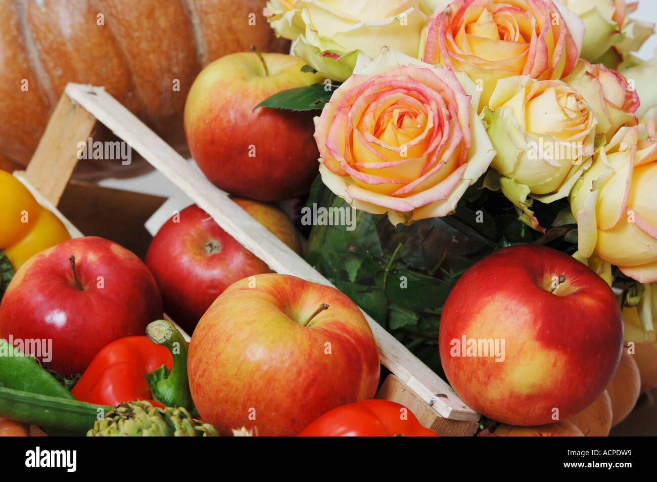 Vegetables apples and roses Stock Photo - Alamy