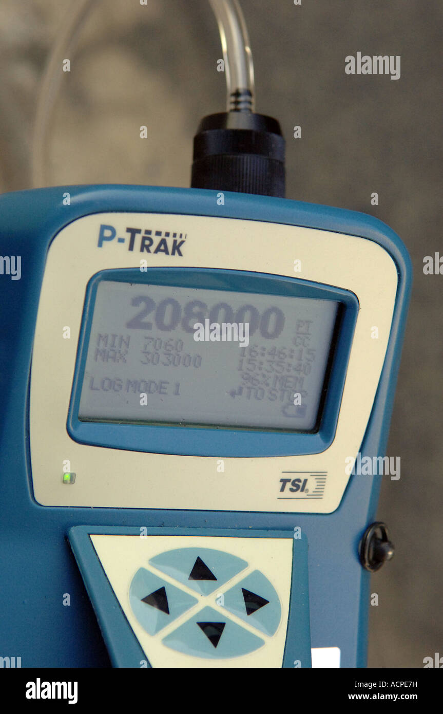 Environmental engineer measures air quality for air pollution in NYC using a particulate meter