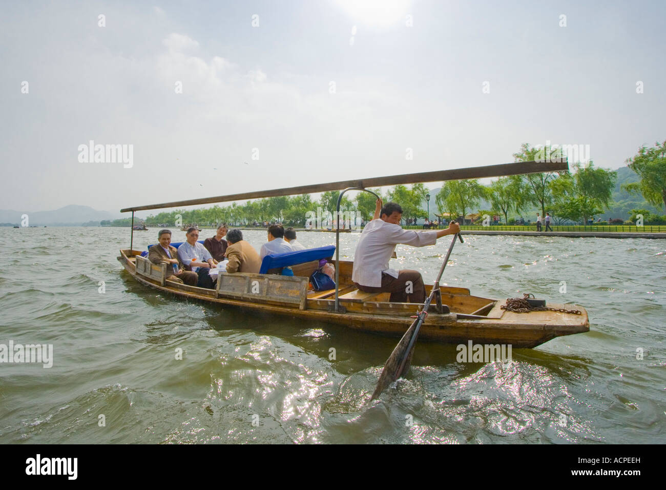 Domestic Chinese in a Tourist Boat Rowing on Xi Hu Lake Hangzhou China Stock Photo