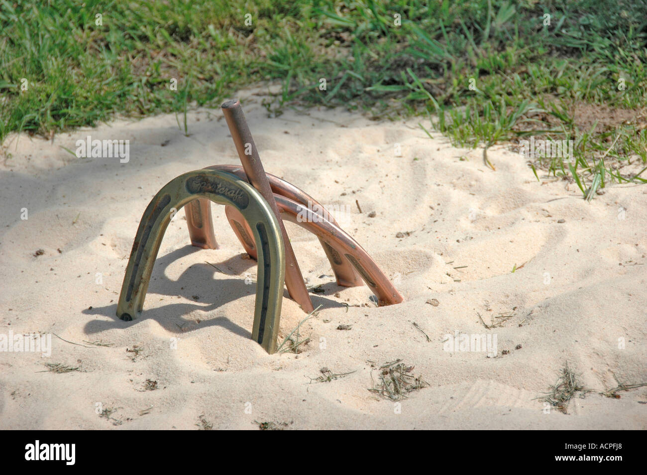 Horseshoe pit and shoes for real game at dude ranch made in backyard of
