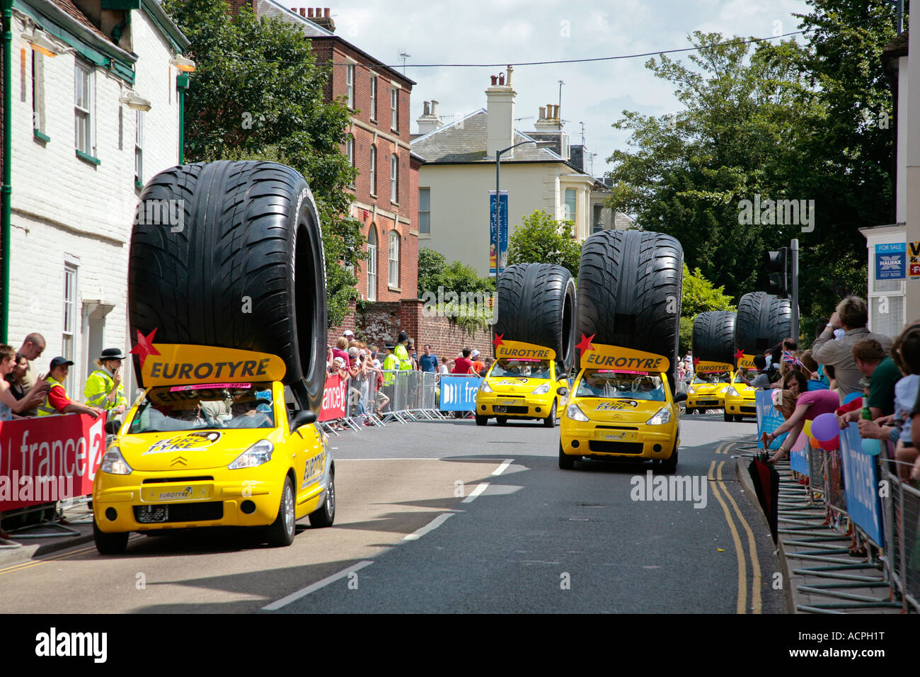 Tour de France car tyre publicity vehicles passing through Canterbury