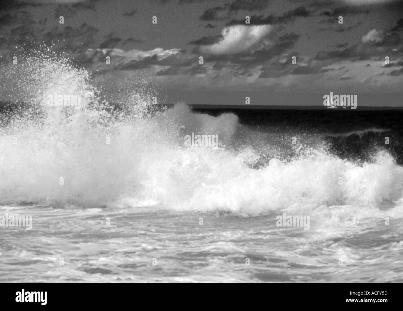 CARIBBEAN SEASCAPE WITH YACHT Stock Photo