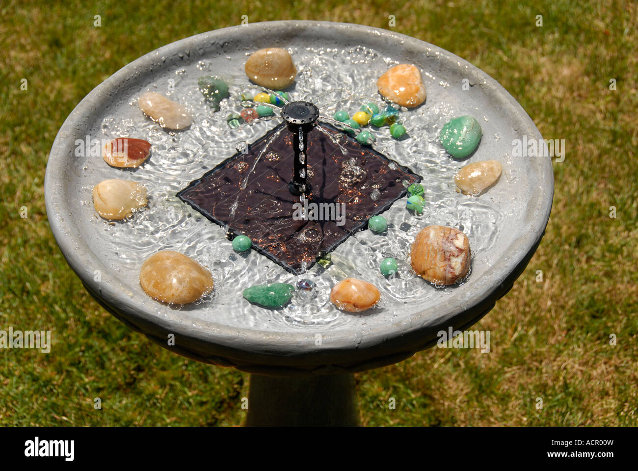 Solar energy driven birdbath and fountain Stock Photo Alamy