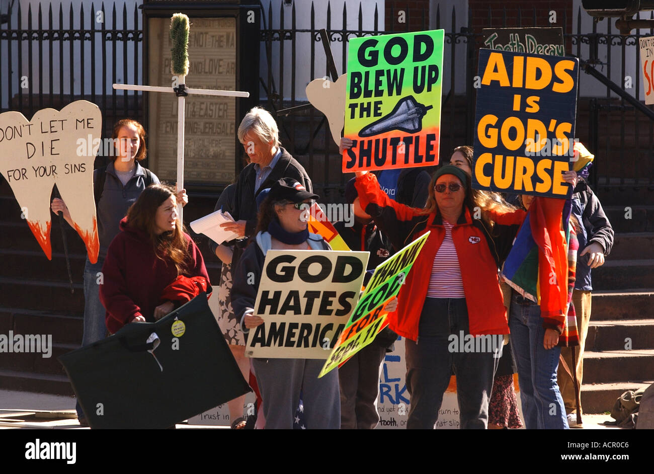 Anti gay hate activists with signs Stock Photo