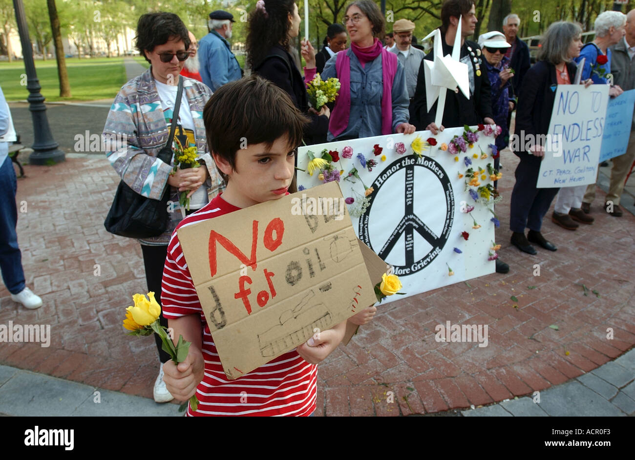 A young War protester protests the Iraq War in the United States Stock Photo