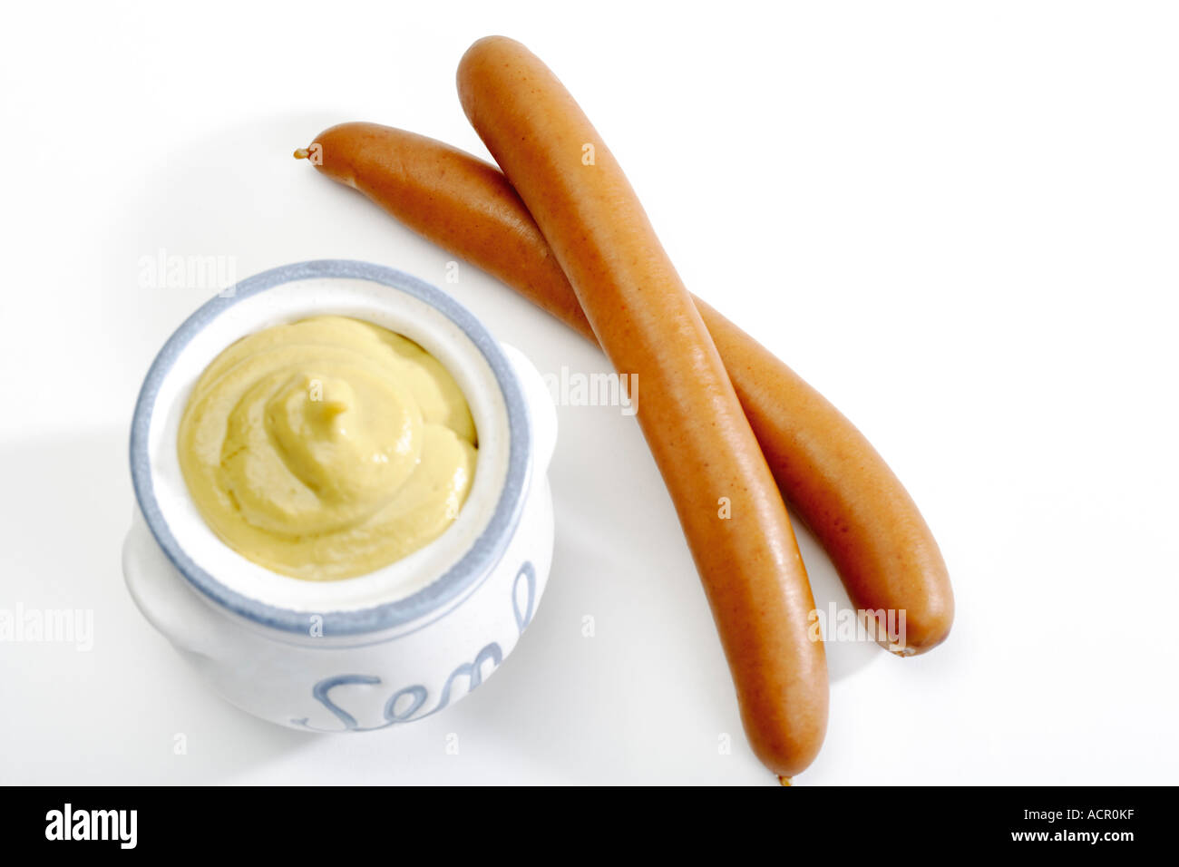 Wiener with mustard, elevated view Stock Photo