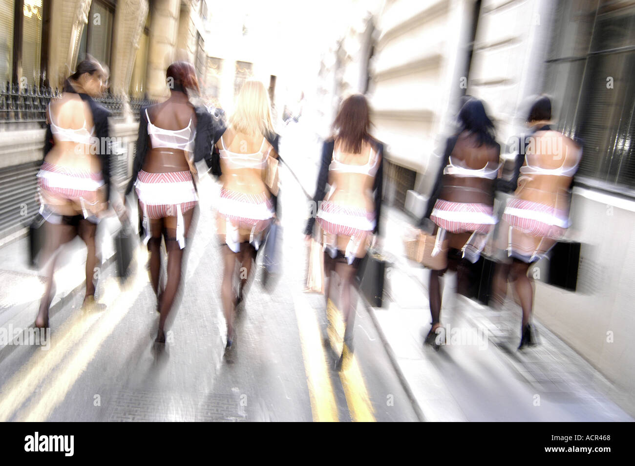 SEMI NAKED BUSINESS WOMEN PARADE THE STREETS OF LONDON IN BUSINESS