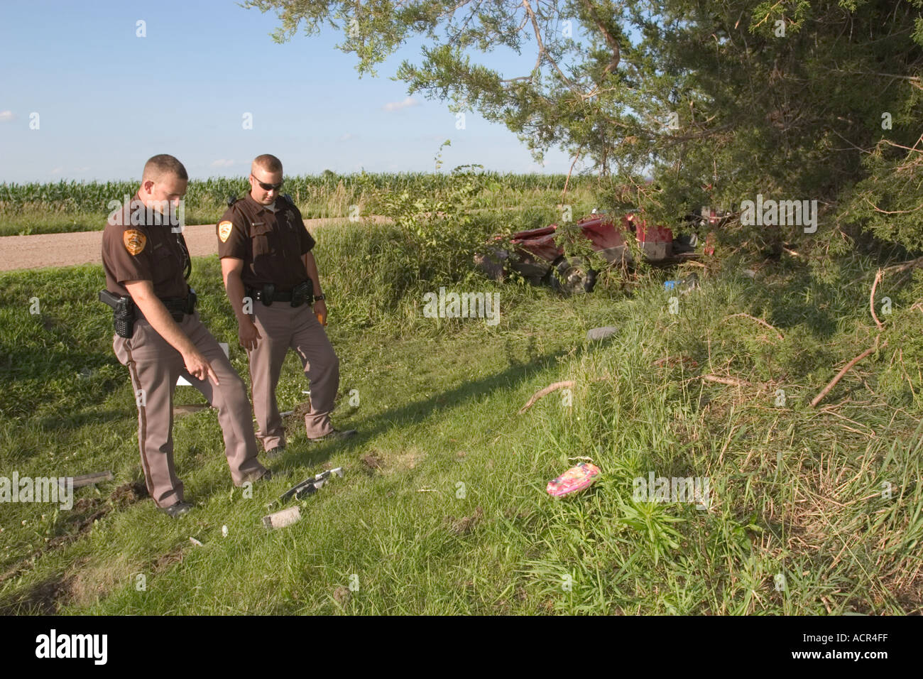 Deputy sheriffs at the scene of a traffic accident. Saline County