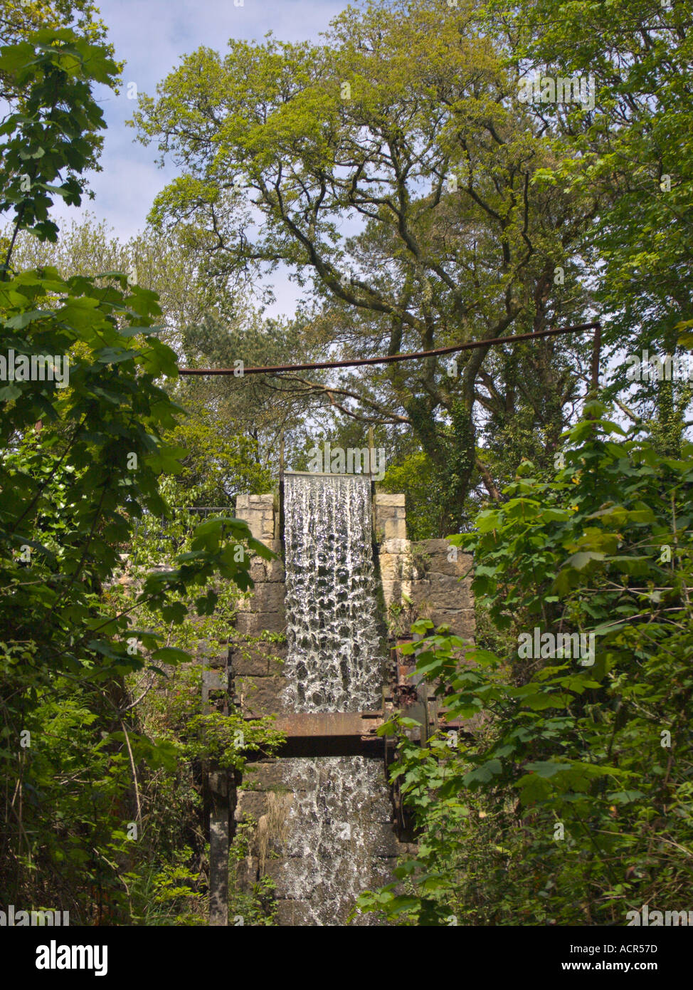 Remains of an industrial water wheel Stock Photo