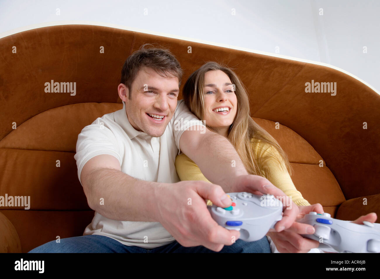 Young couple playing video game, close-up Stock Photo