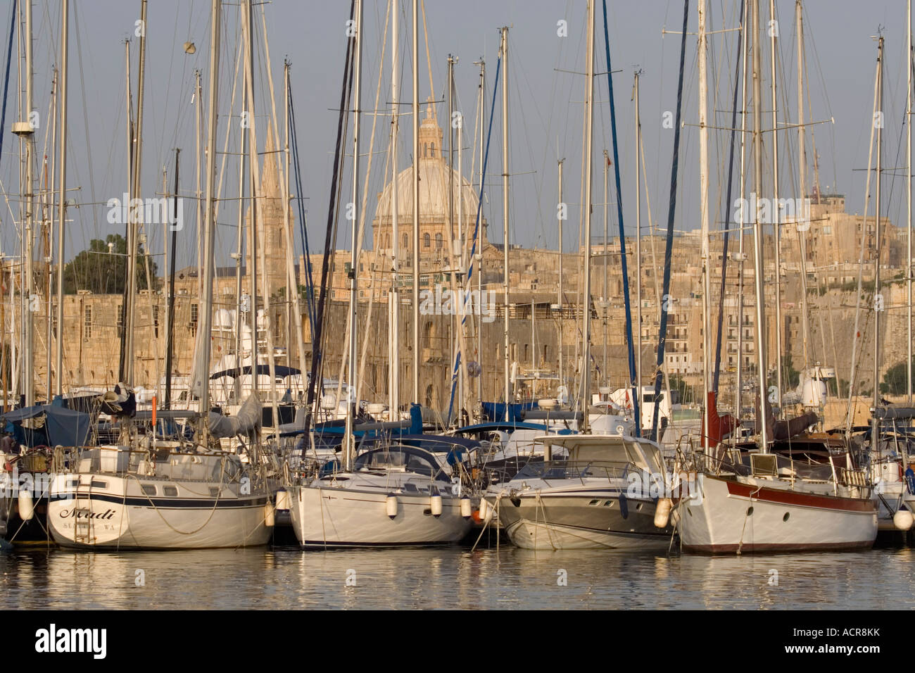 Yachts in Marsamxett, Malta, with Valletta in the background Stock Photo