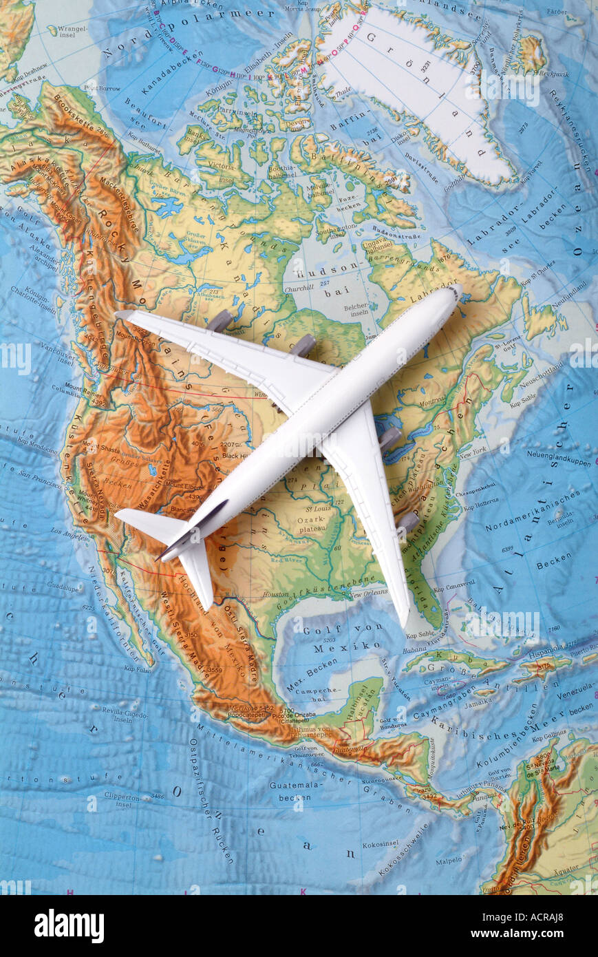 airplane on a map of north america Flugzeug auf einer Karte von USA Nordamerika Kanada Stock Photo