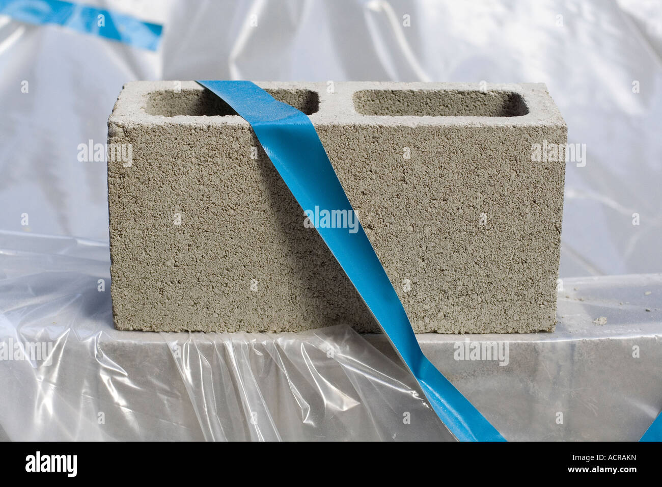 cinder block blue tape plastic tarp Stock Photo Alamy