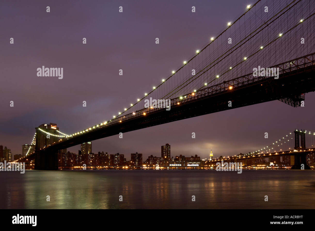 Brooklyn and Manhattan bridge at dusk New York USA Stock Photo