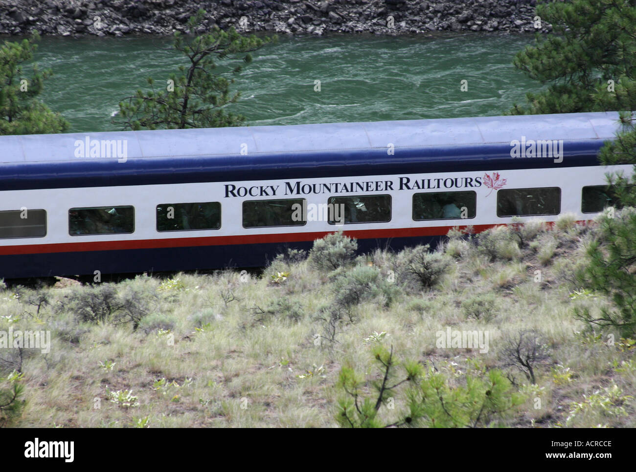 Rocky Mountaineer Railtours Train travelling by the Thompson River near Spencers Bridge in British Columbia Canada Stock Photo