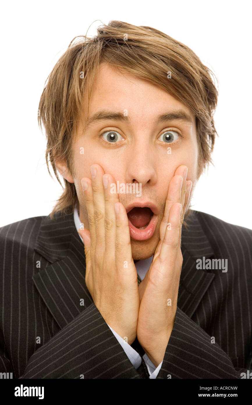 Businessman in suite gestures shock and slaps his face Stock Photo Alamy