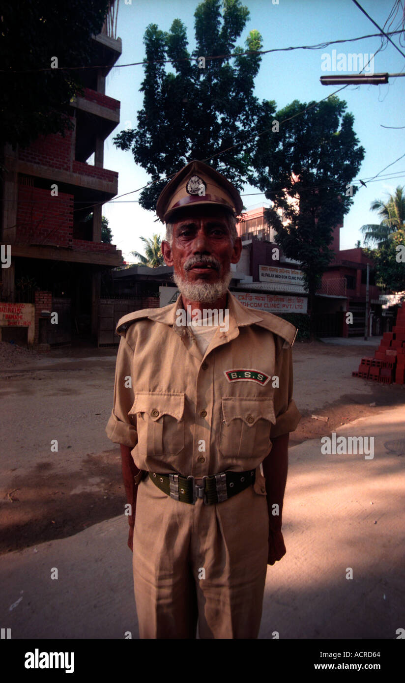 Bangladesh security guard standing proud in his uniform Stock Photo Alamy