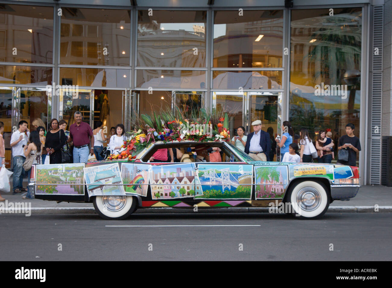 Cadillac Sedan de Ville covered in San Francisco postcard images at Union Square San Francisco California Stock Photo