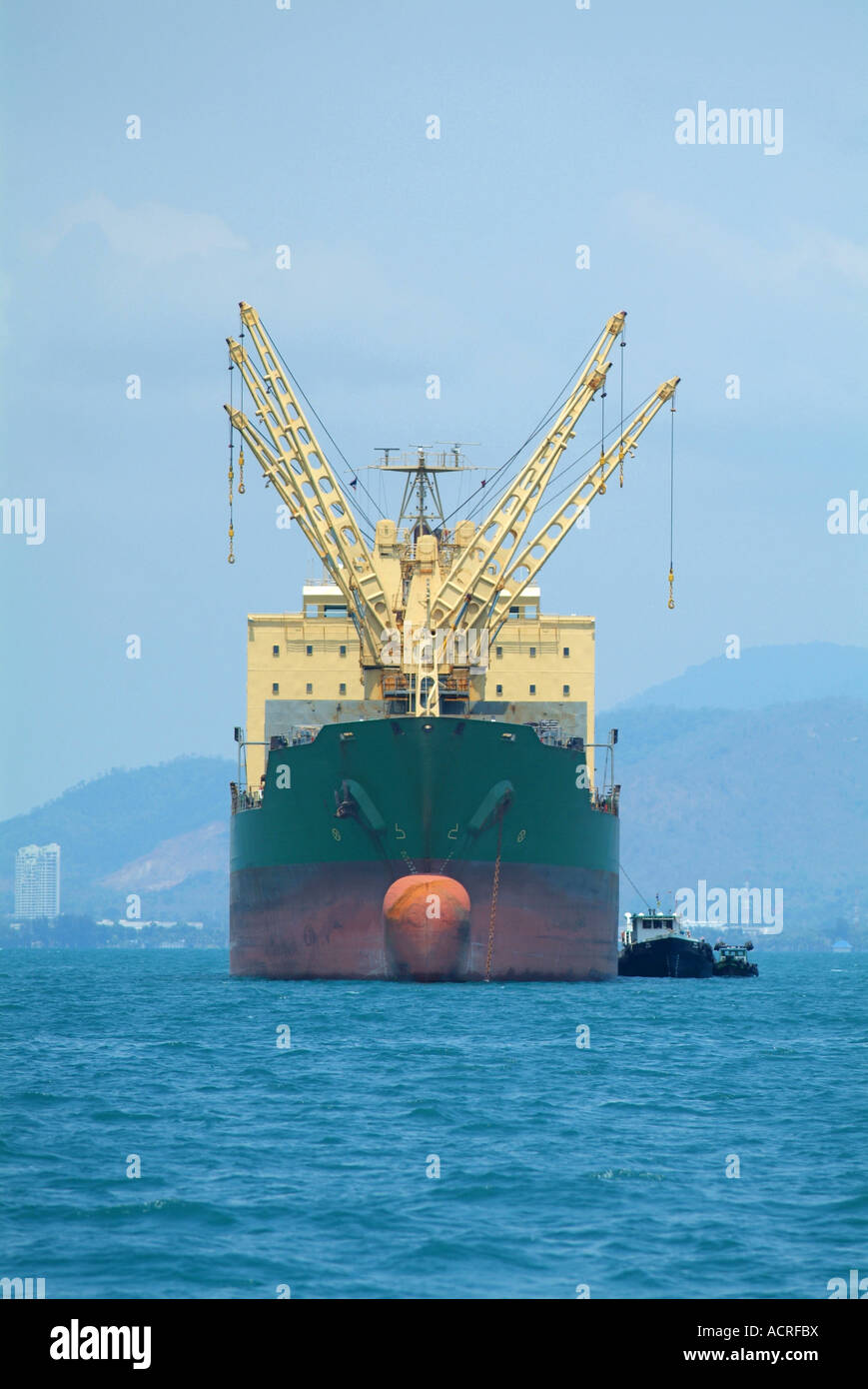 Cargo ship unloading Stock Photo - Alamy