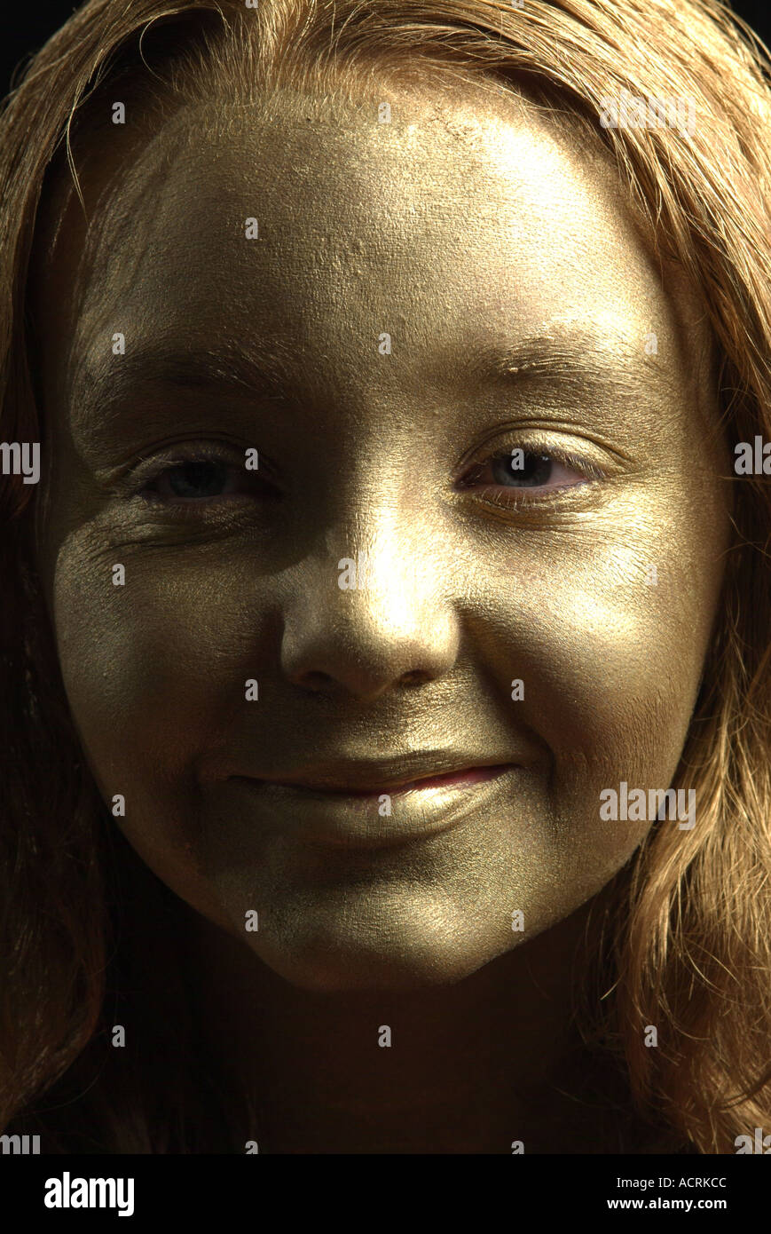 Download Gold Face Girl With Half Face Shadowed Eyes Open Smile Stock Photo Alamy PSD Mockup Templates
