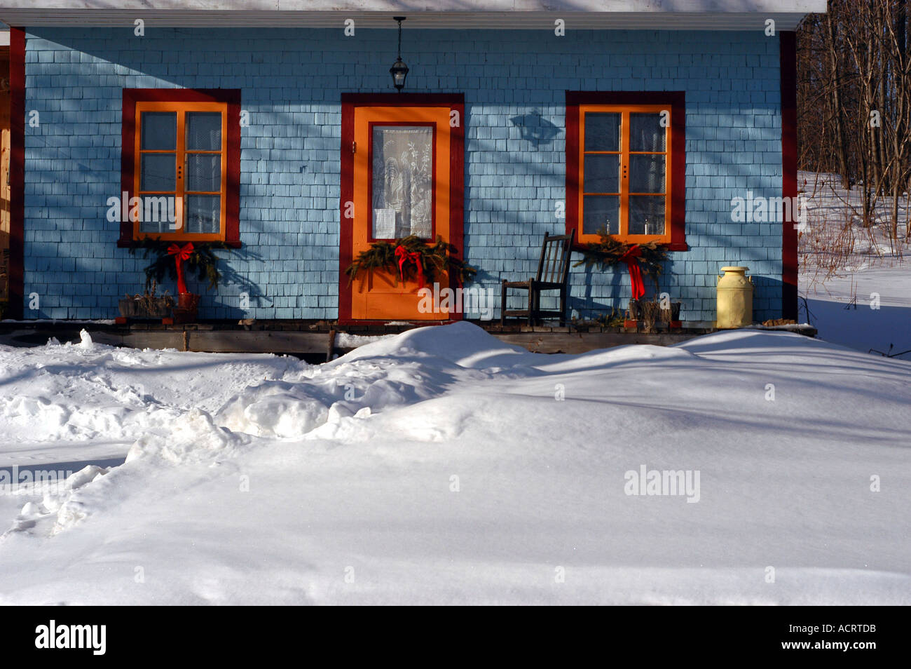 Blue house Winter Monteregie area Quebec canada Stock Photo